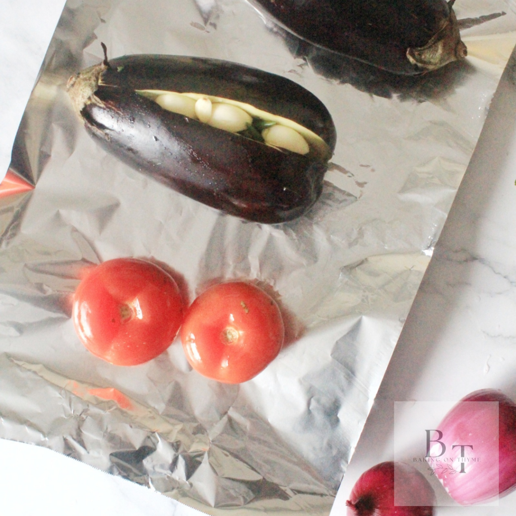 eggplant and tomatoes with purple onions