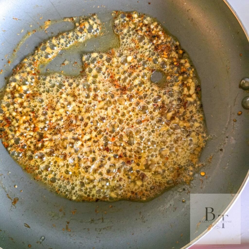 garlic and butter frying in a pan